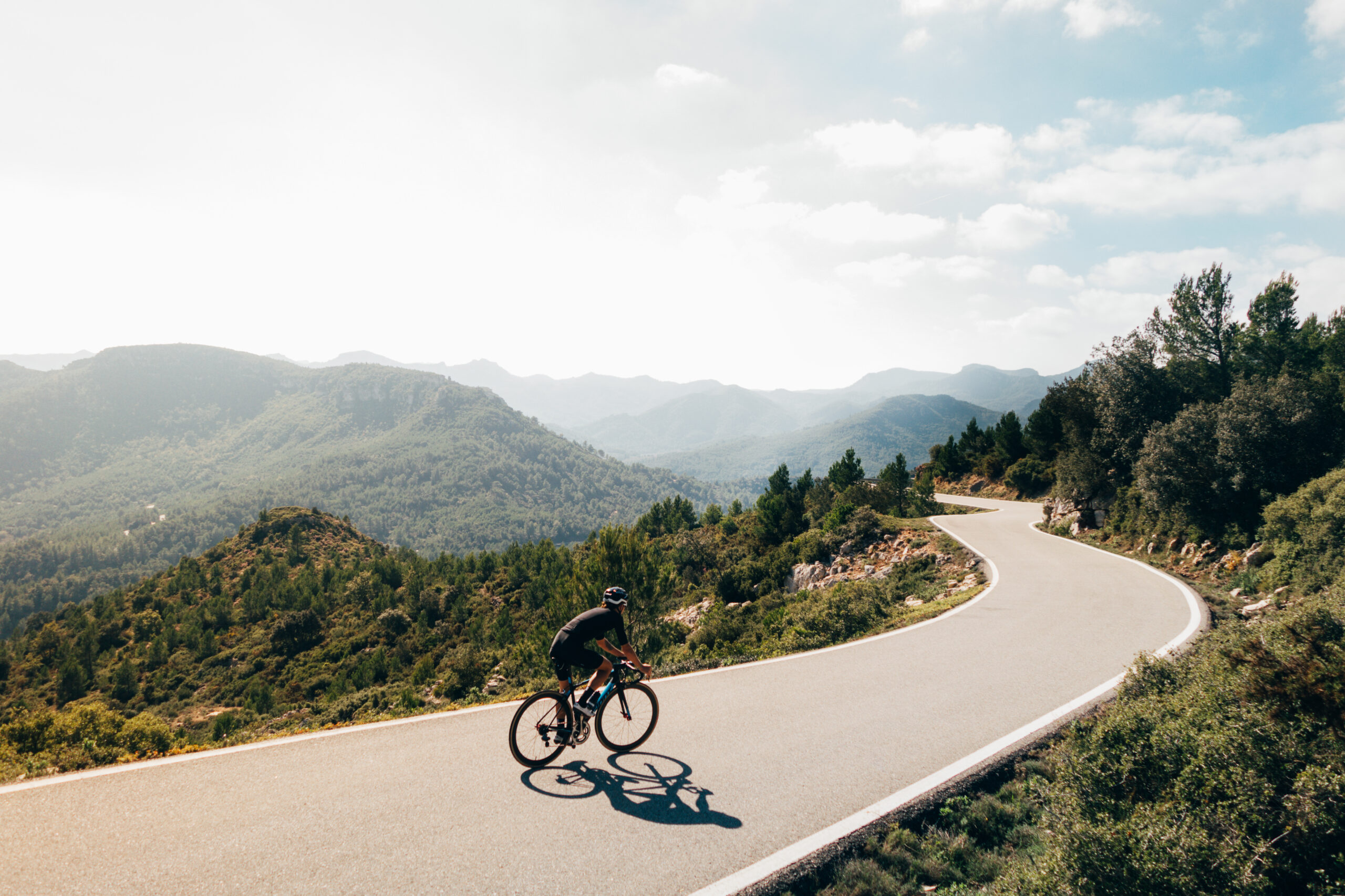 silhouette of the cyclist riding a road bike at sunset.Mountain bicycle and man.Life style outdoor